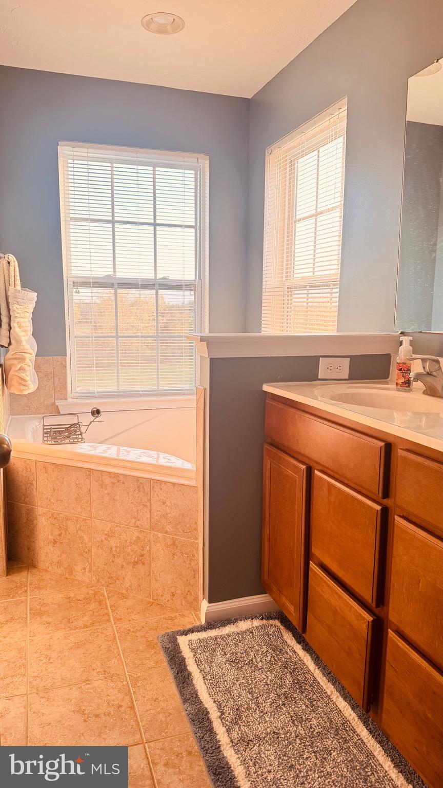 2295 Harney Road Littlestown, PA 17340 - Photo 24 of 37 a bathroom with a sink and a vanity
