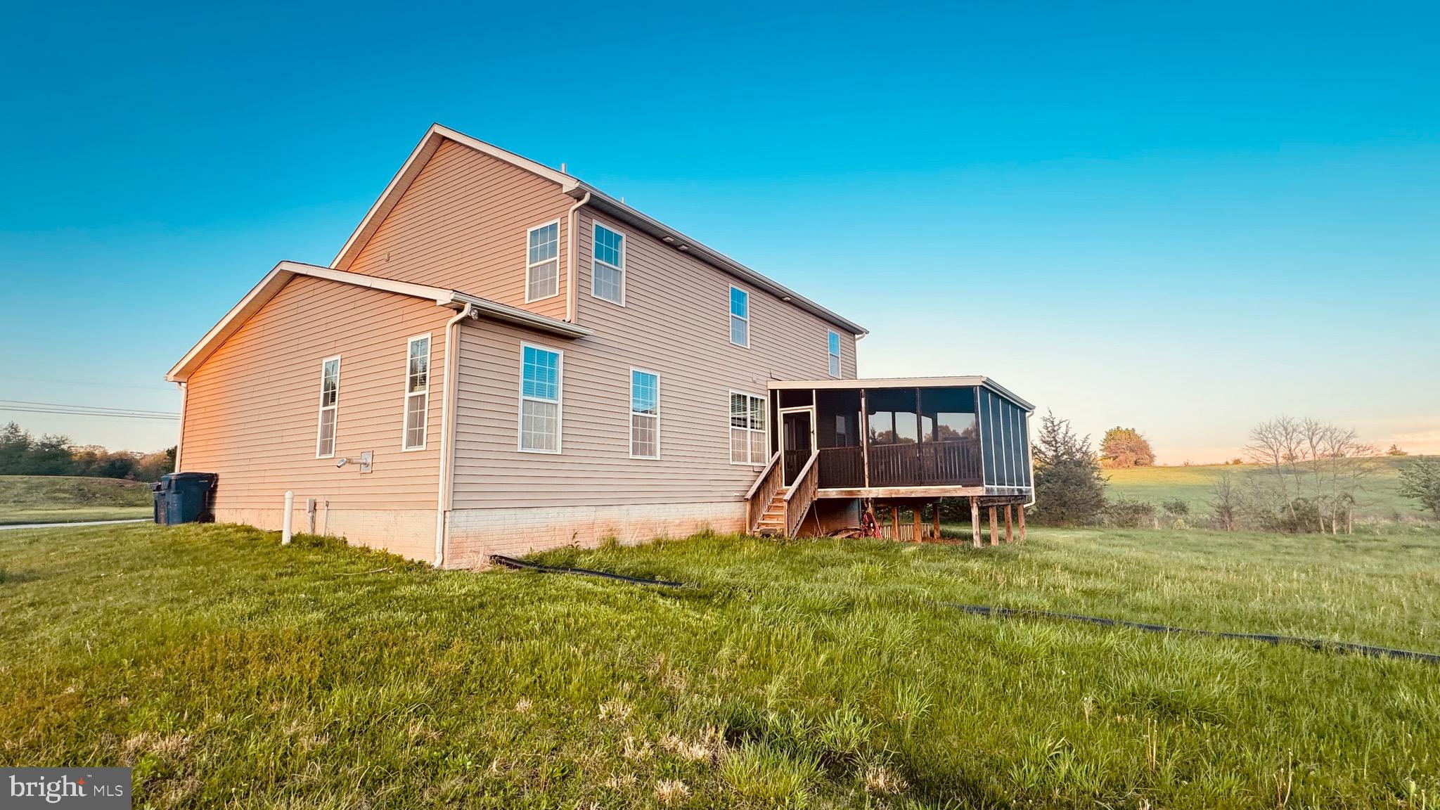 2295 Harney Road Littlestown, PA 17340 - Photo 6 of 37 a front view of a house with garden