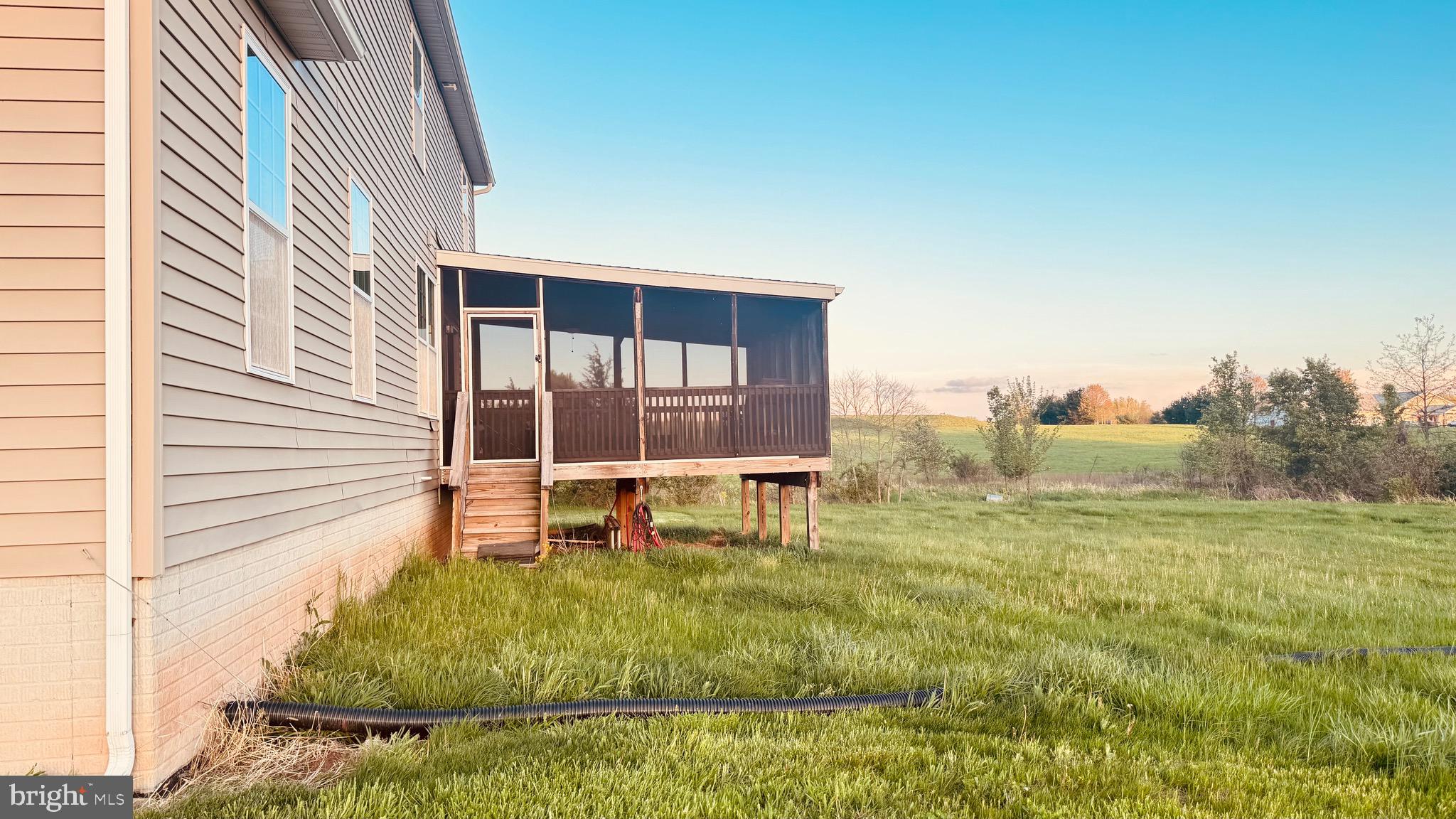 2295 Harney Road Littlestown, PA 17340 - Photo 7 of 37 a view of an house with backyard space and balcony