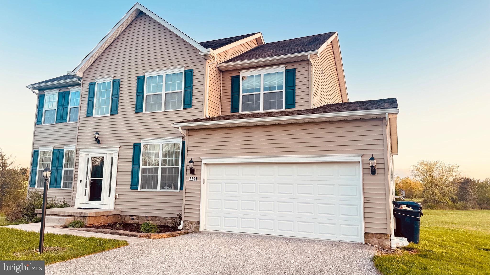 2295 Harney Road Littlestown, PA 17340 - Photo 10 of 37 a front view of a house with a garage