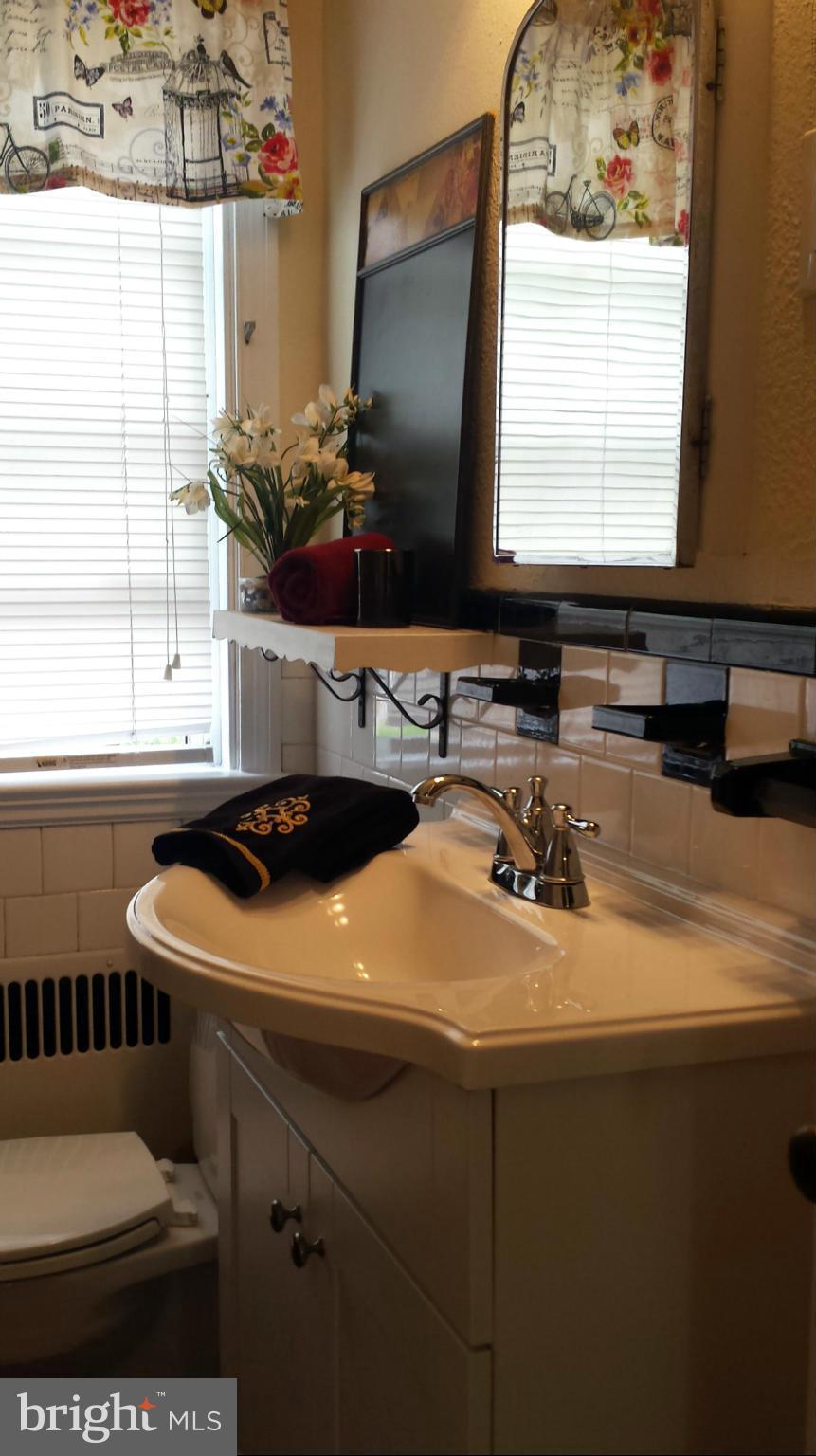 59 Burkshire Road Baltimore, MD 21286 - Photo 17 of 28 Updated Full Bathroom maintains Charm of House