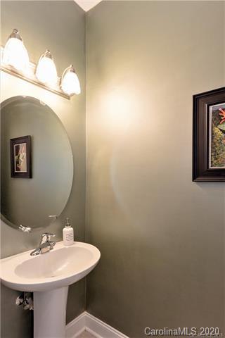 294 Chisholm Trail Rutherfordton, NC 28139 - Photo 16 of 31 a bathroom with a sink and mirror