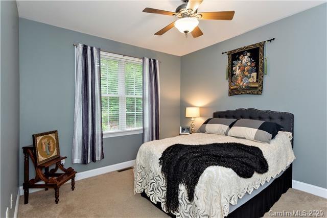 294 Chisholm Trail Rutherfordton, NC 28139 - Photo 22 of 31 a bedroom with a bed and chair