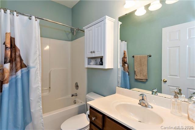 294 Chisholm Trail Rutherfordton, NC 28139 - Photo 23 of 31 a bathroom with a sink toilet and shower
