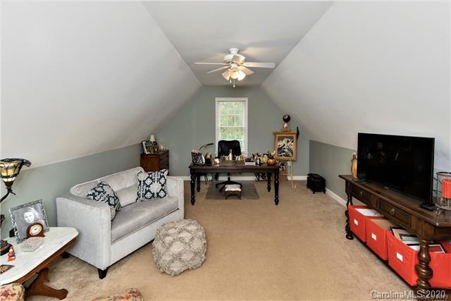 294 Chisholm Trail Rutherfordton, NC 28139 - Photo 24 of 31 a living room with furniture and a flat screen tv