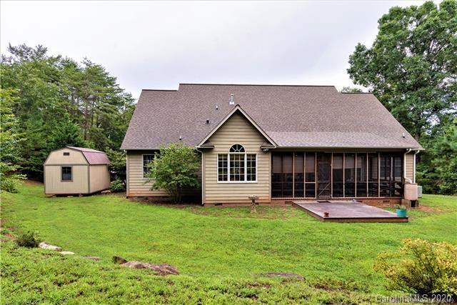 294 Chisholm Trail Rutherfordton, NC 28139 - Photo 29 of 31 a view of a house with a yard and large tree