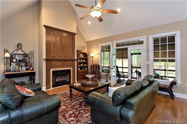 294 Chisholm Trail Rutherfordton, NC 28139 - Photo 5 of 31 a living room with furniture and a fireplace