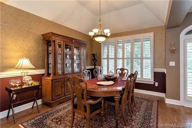 294 Chisholm Trail Rutherfordton, NC 28139 - Photo 8 of 31 a view of a dining room with furniture window and wooden floor