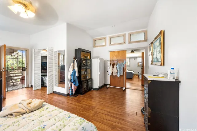 a view of a livingroom with furniture and a flat screen tv