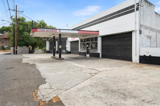 a view of a building with a garage