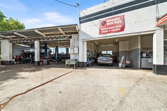 a view of a building with sitting area