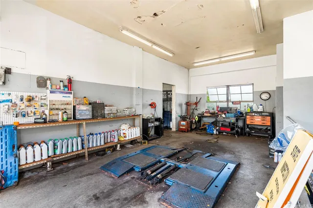 a room with lots of furniture and clutter