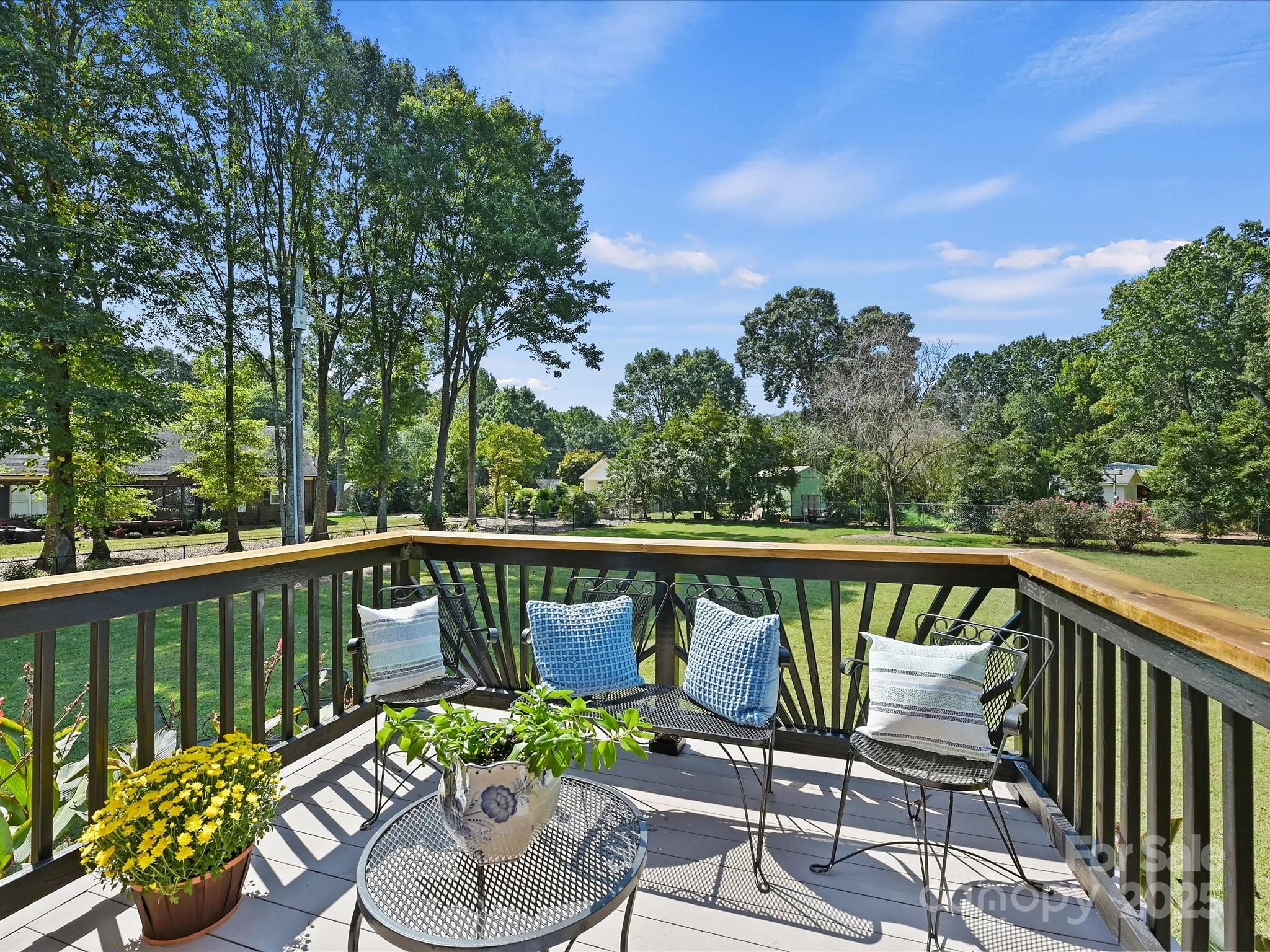 7146 Sifford Road Stanley, NC 28164 - Photo 17 of 42 a balcony with wooden floor and outdoor seating