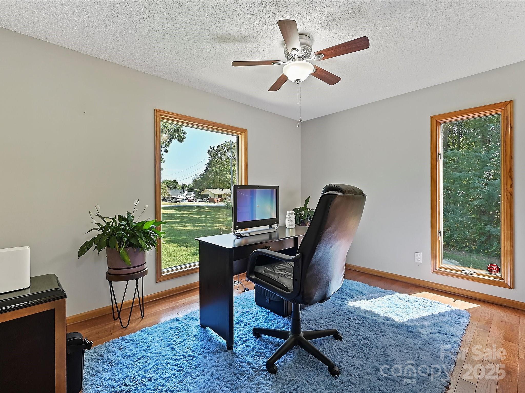 7146 Sifford Road Stanley, NC 28164 - Photo 20 of 42 a workspace with furniture and a window