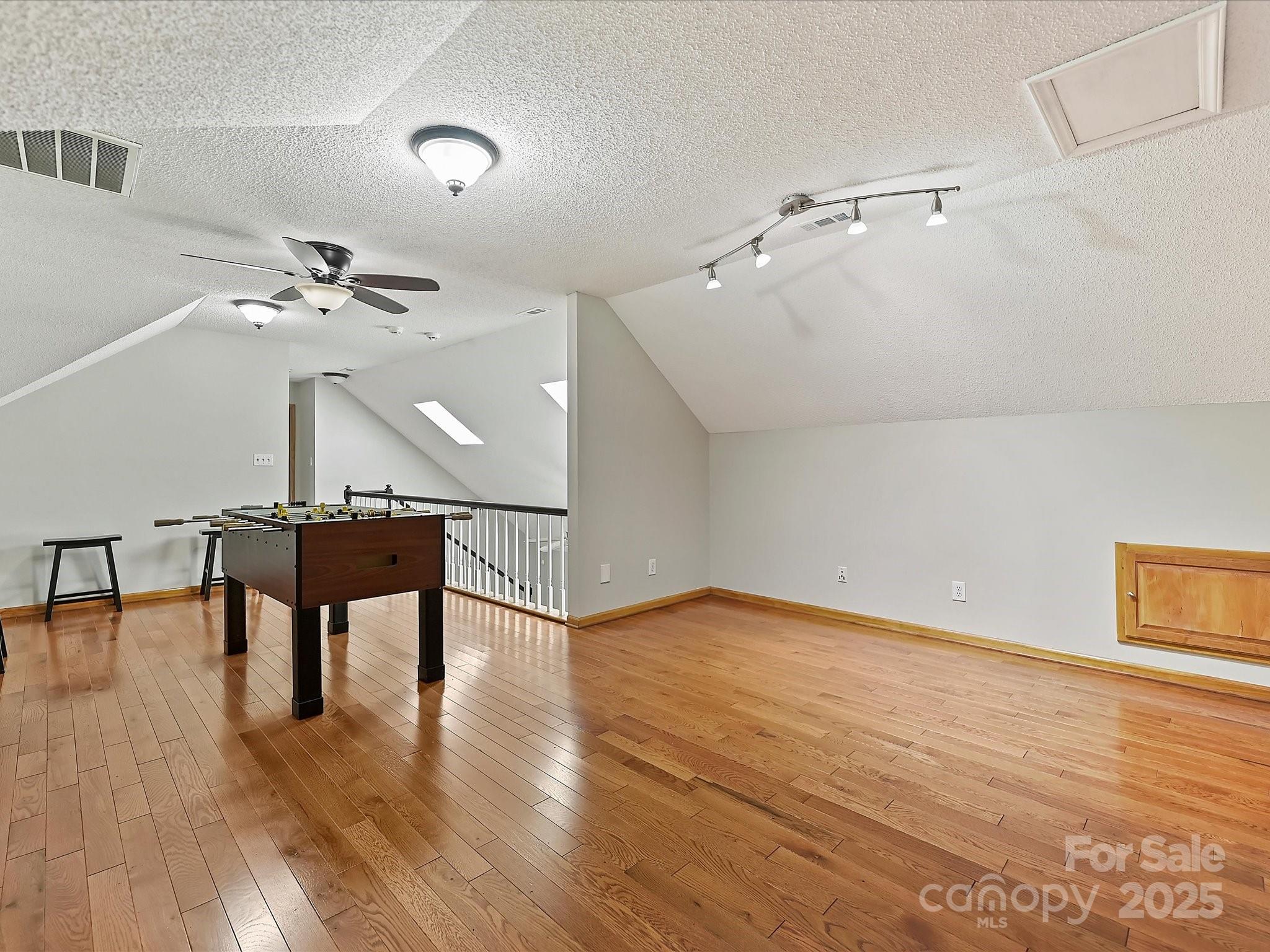 7146 Sifford Road Stanley, NC 28164 - Photo 24 of 42 wooden floor in an empty room with a window