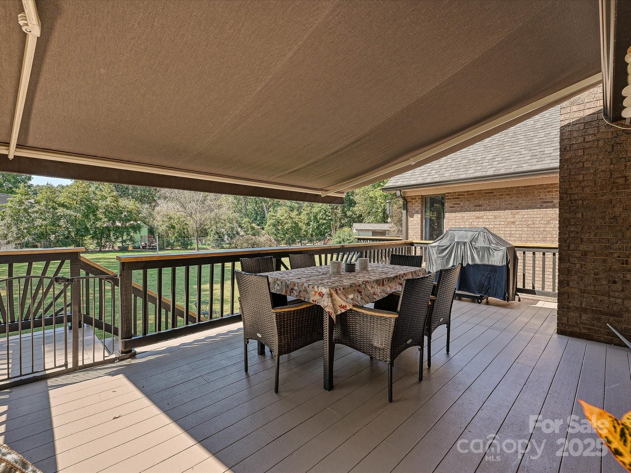 7146 Sifford Road Stanley, NC 28164 - Photo 30 of 42 a dining room with furniture and wooden floor