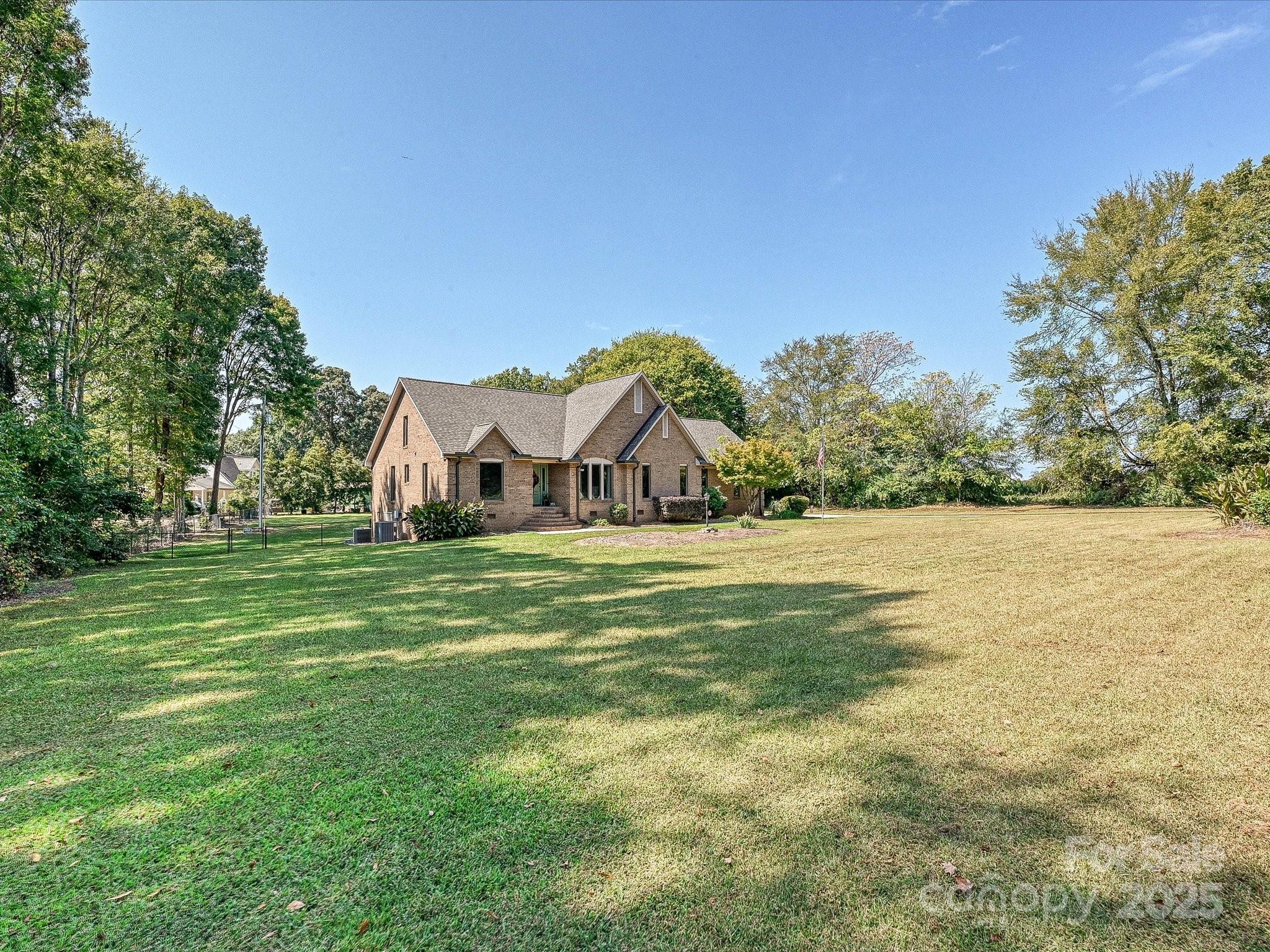 7146 Sifford Road Stanley, NC 28164 - Photo 39 of 42 a house view with a garden space