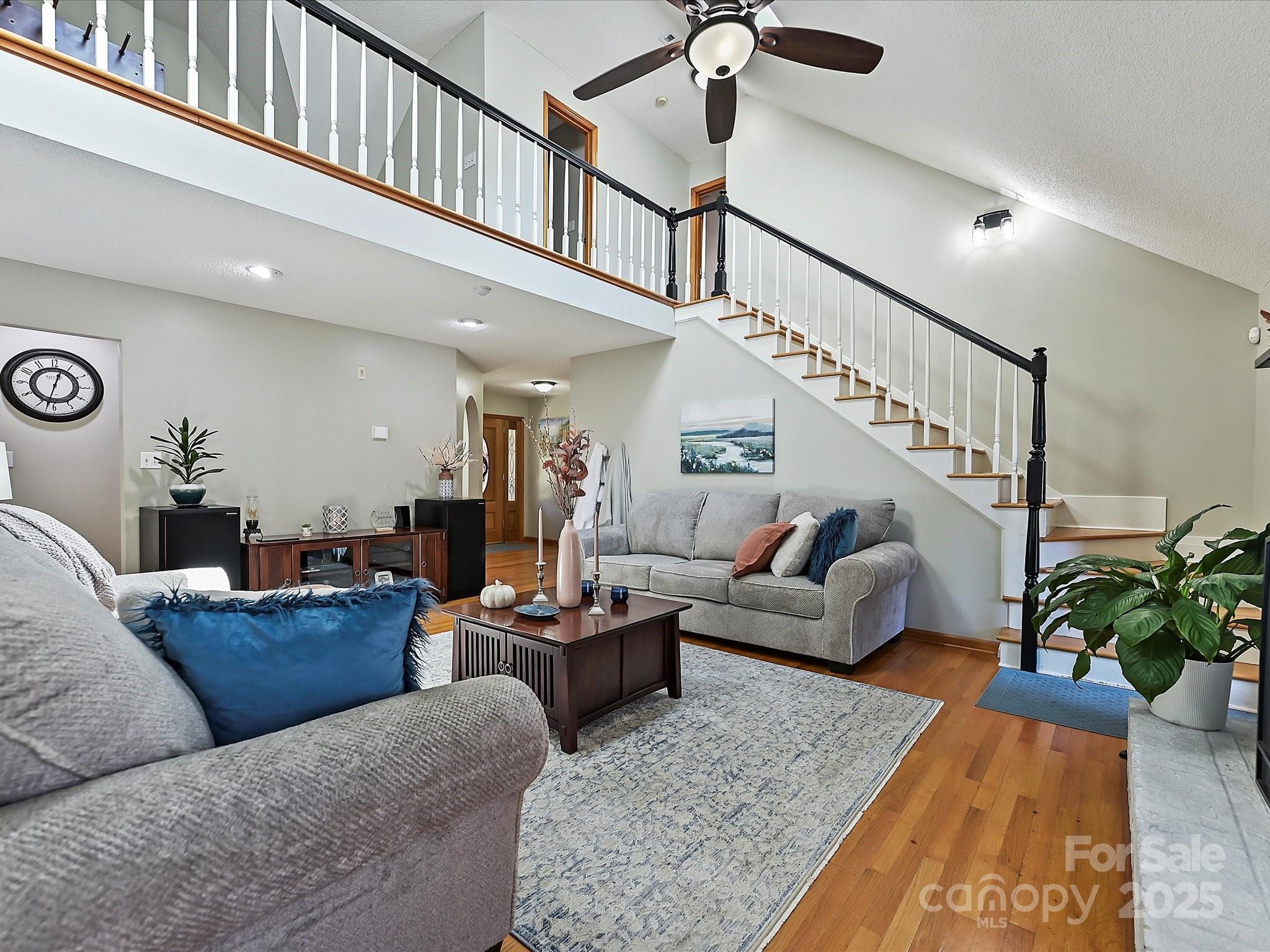7146 Sifford Road Stanley, NC 28164 - Photo 6 of 42 a living room with furniture and a potted plant