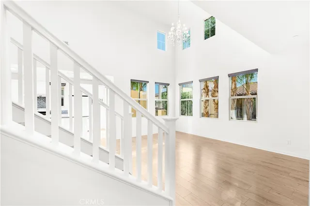 a view of an entryway with wooden floor