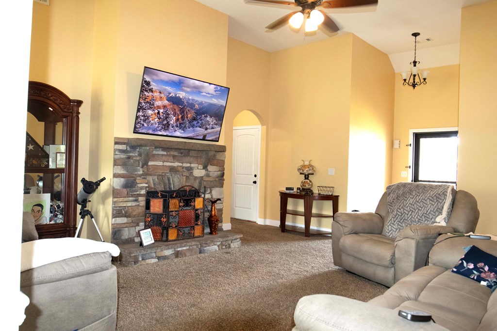 147 McLendon Road Fort Mitchell, AL 36856 - Photo 3 of 17 a living room with furniture and a fireplace
