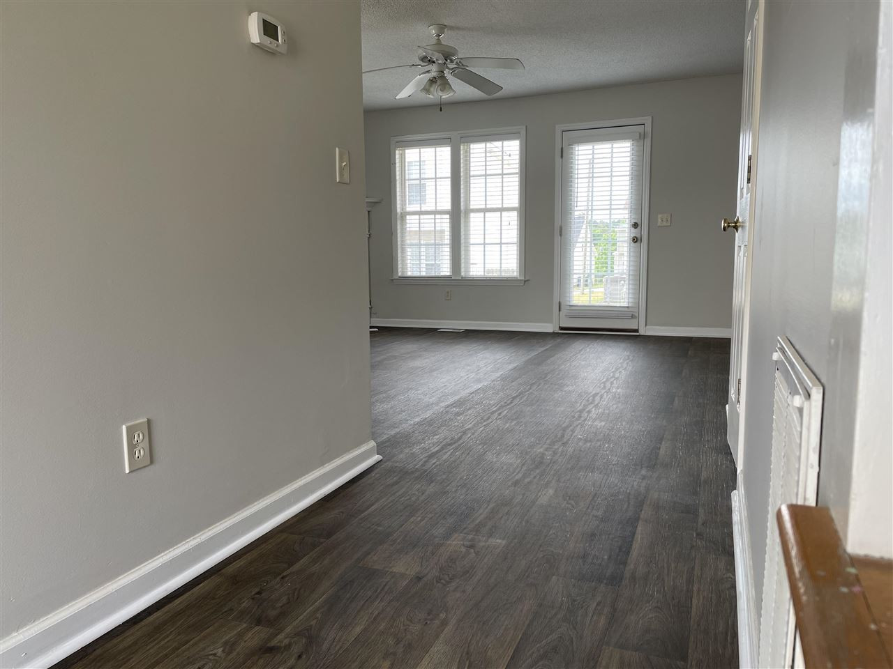 4408 Windsock Lane Raleigh, NC 27616 - Photo 10 of 22 Living room was updated to linoleum flooring Living room was updated to linoleum flooring