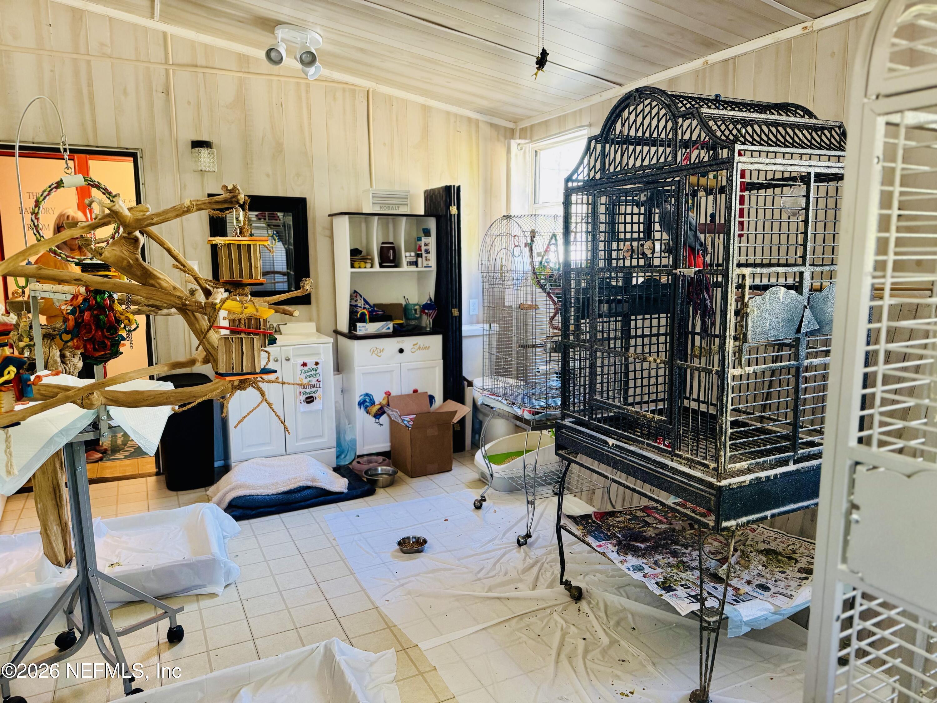 4700 Berry Court Keystone Heights, FL 32656 - Photo 30 of 65 a view of gym equipment and outdoor seating