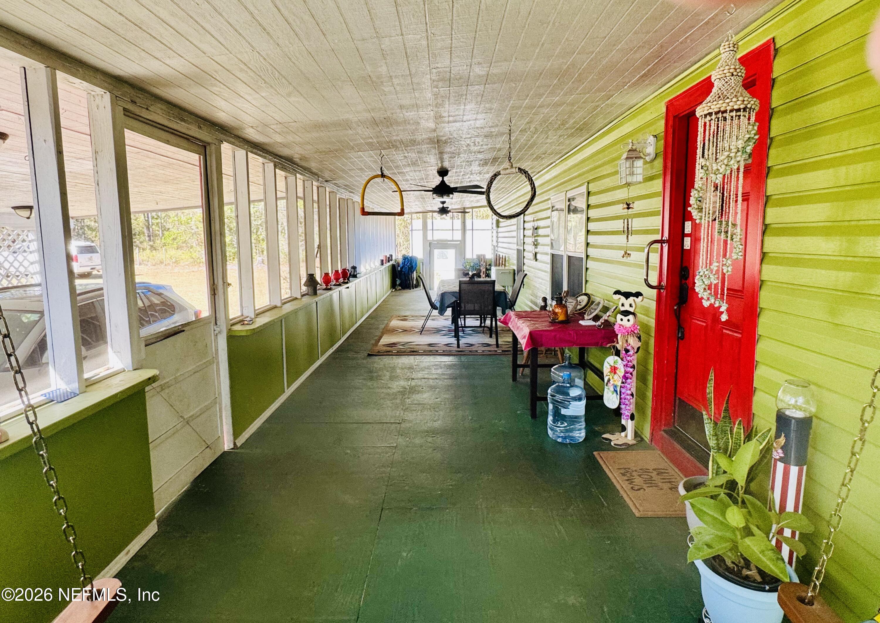 4700 Berry Court Keystone Heights, FL 32656 - Photo 44 of 65 a view of an outdoor space with seating area