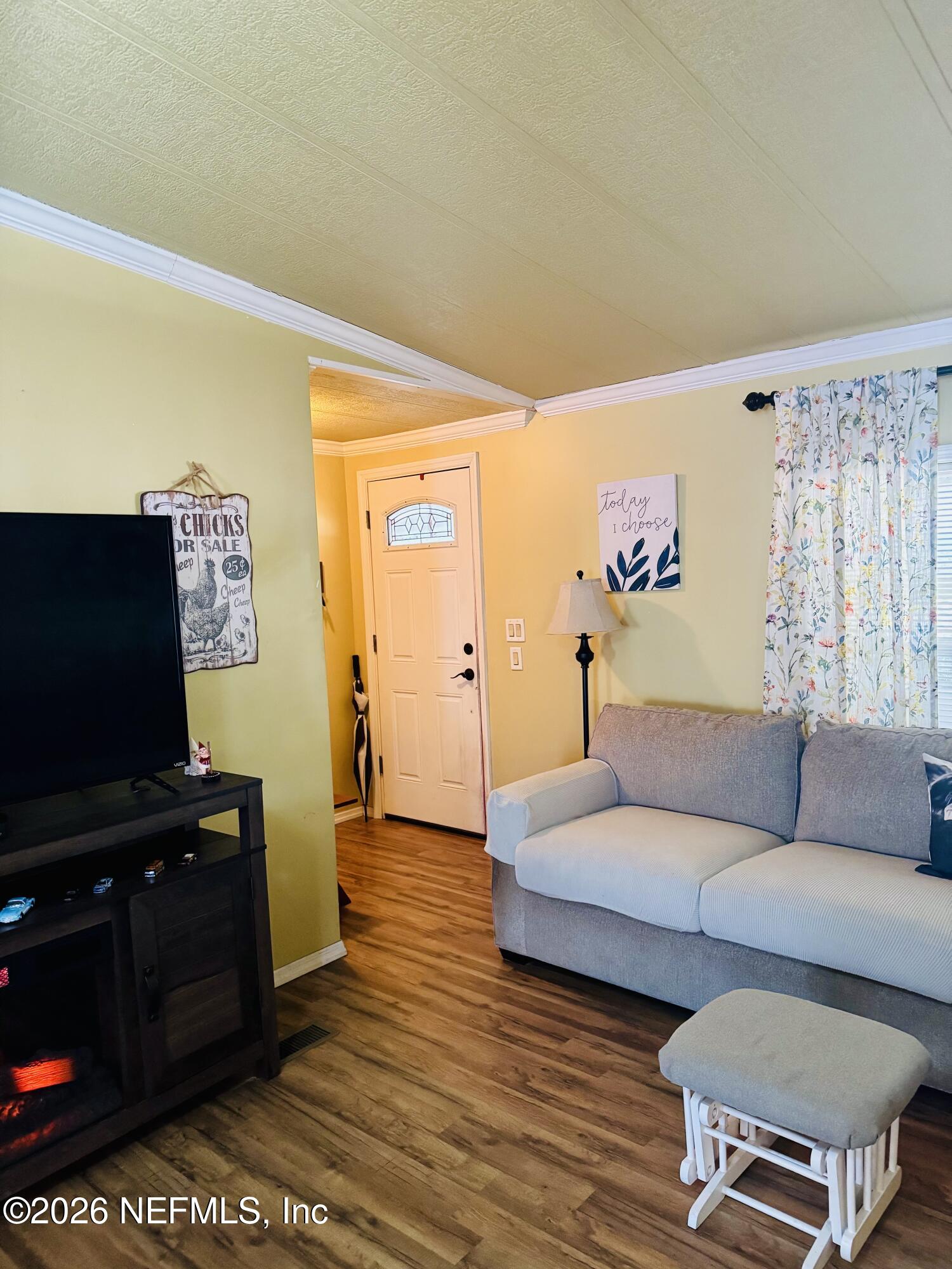 4700 Berry Court Keystone Heights, FL 32656 - Photo 5 of 65 a living room with furniture and wooden floor