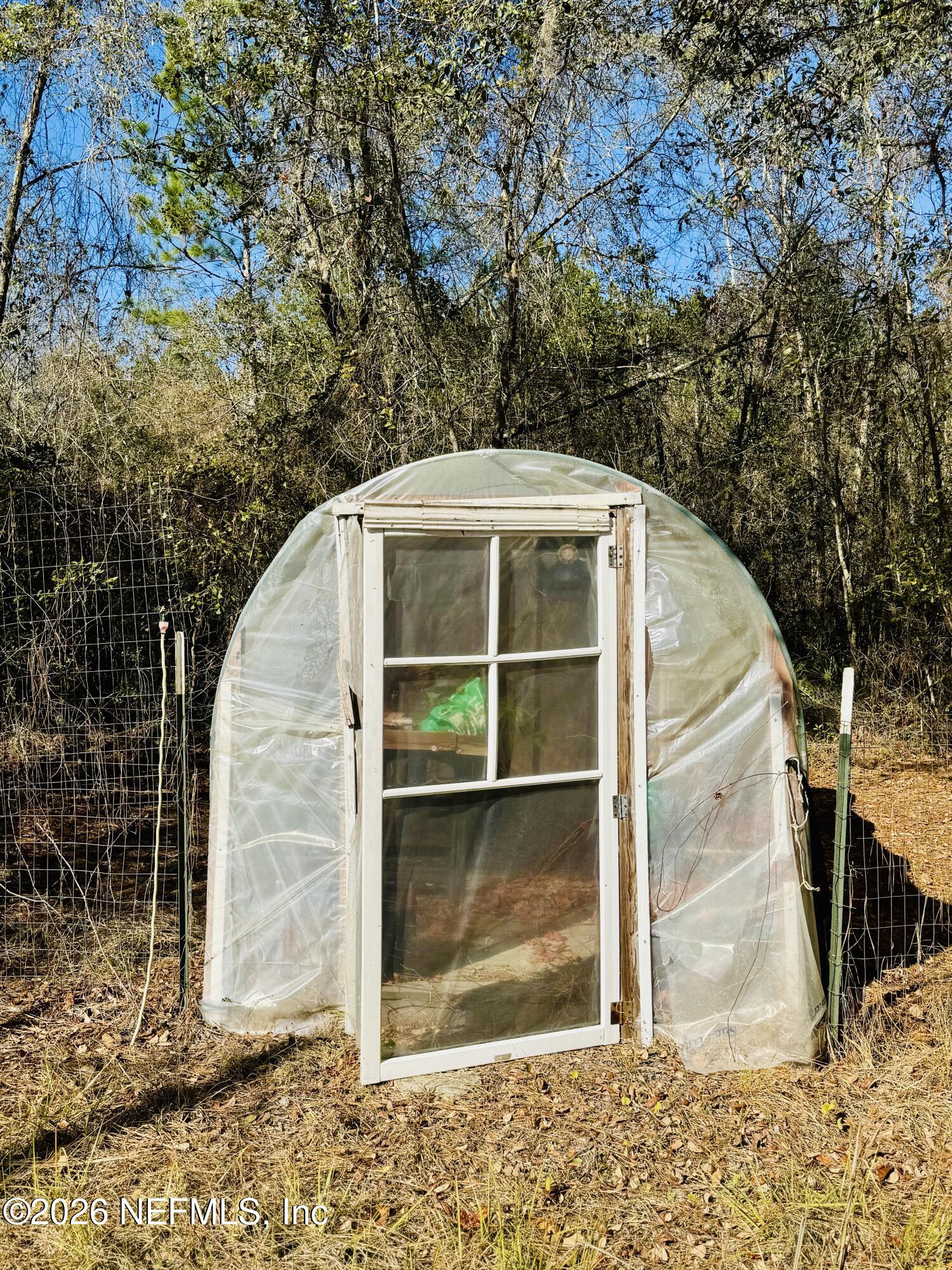 4700 Berry Court Keystone Heights, FL 32656 - Photo 51 of 65 a view of a wooden door