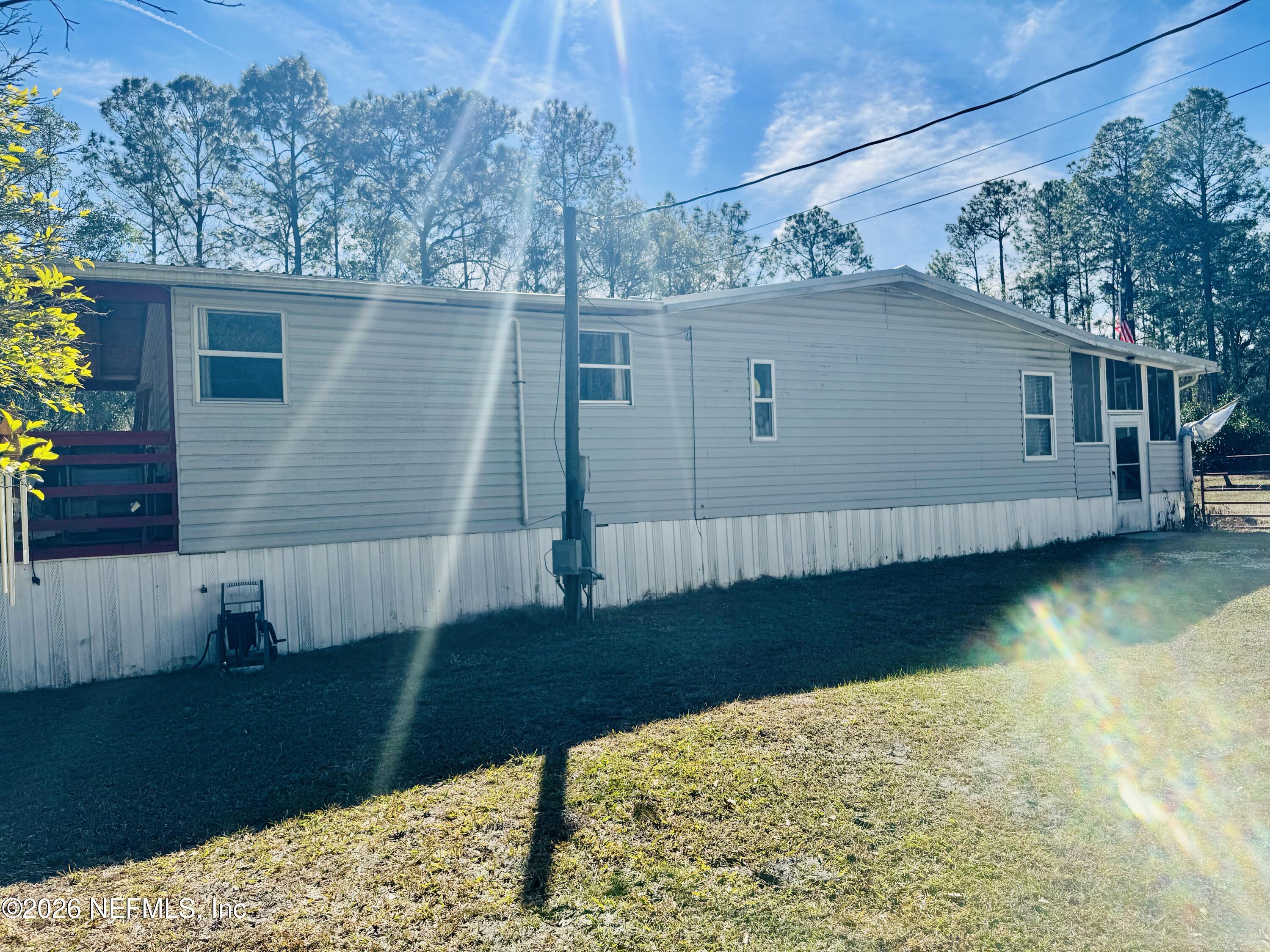 4700 Berry Court Keystone Heights, FL 32656 - Photo 55 of 66 Side View of Home