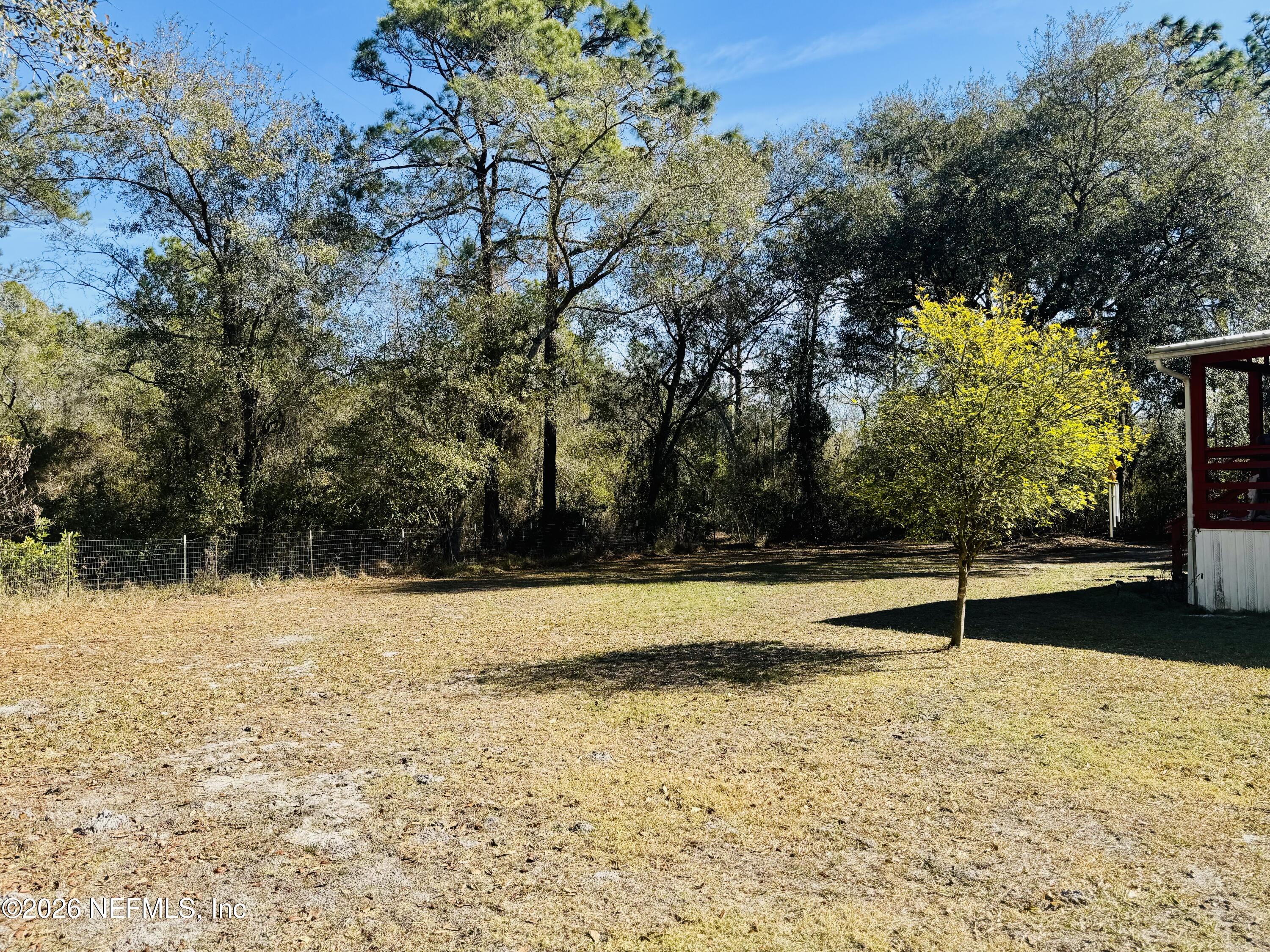 4700 Berry Court Keystone Heights, FL 32656 - Photo 64 of 65 a backyard of a house