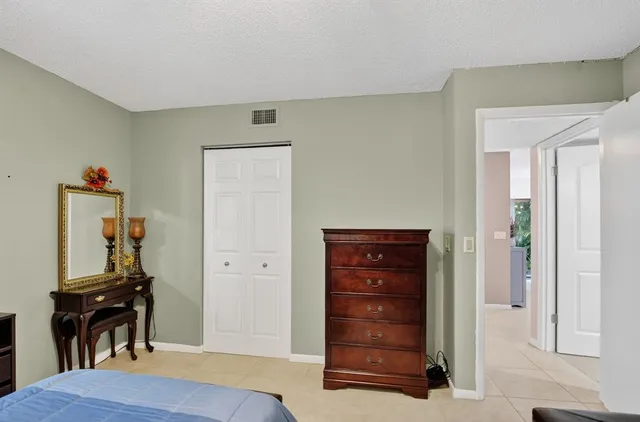 a bathroom with a shower a toilet and a shower