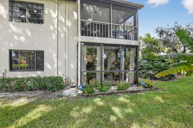 a view of lake with green space