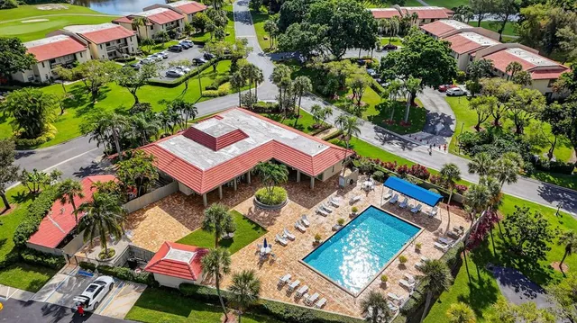 a picture of a wall with a white building