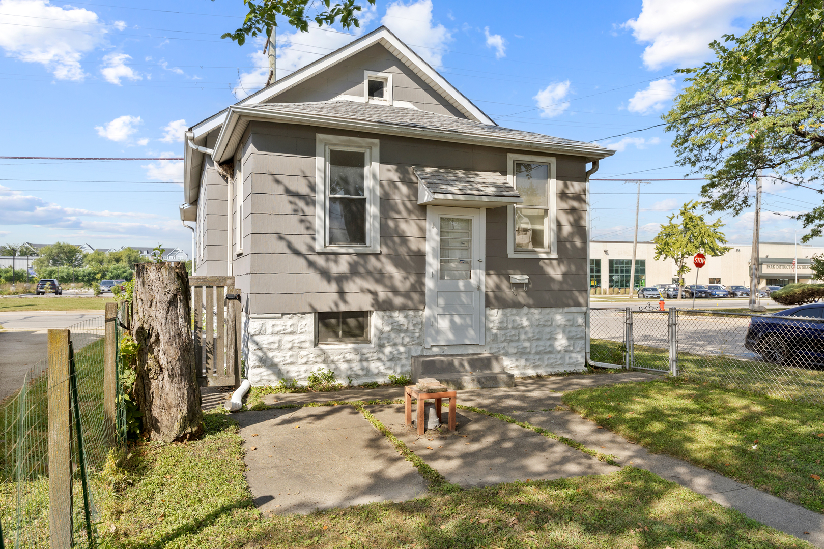 4601 Eberly Avenue Brookfield, IL 60513 - Photo 17 of 22 a front view of a house with garden