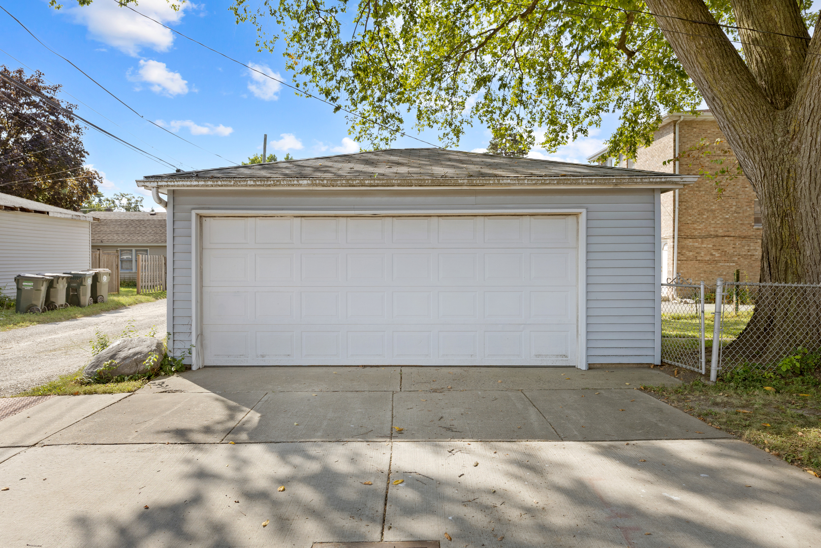 4601 Eberly Avenue Brookfield, IL 60513 - Photo 22 of 22 a view of a house with a yard