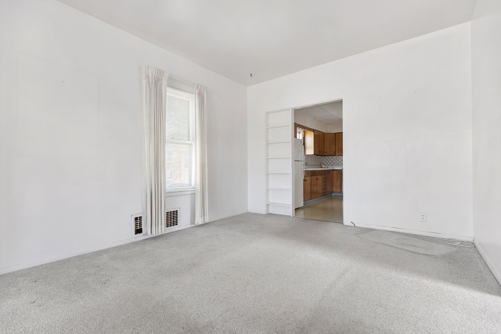 4601 Eberly Avenue Brookfield, IL 60513 - Photo 5 of 22 an empty room with an entryway and an empty room