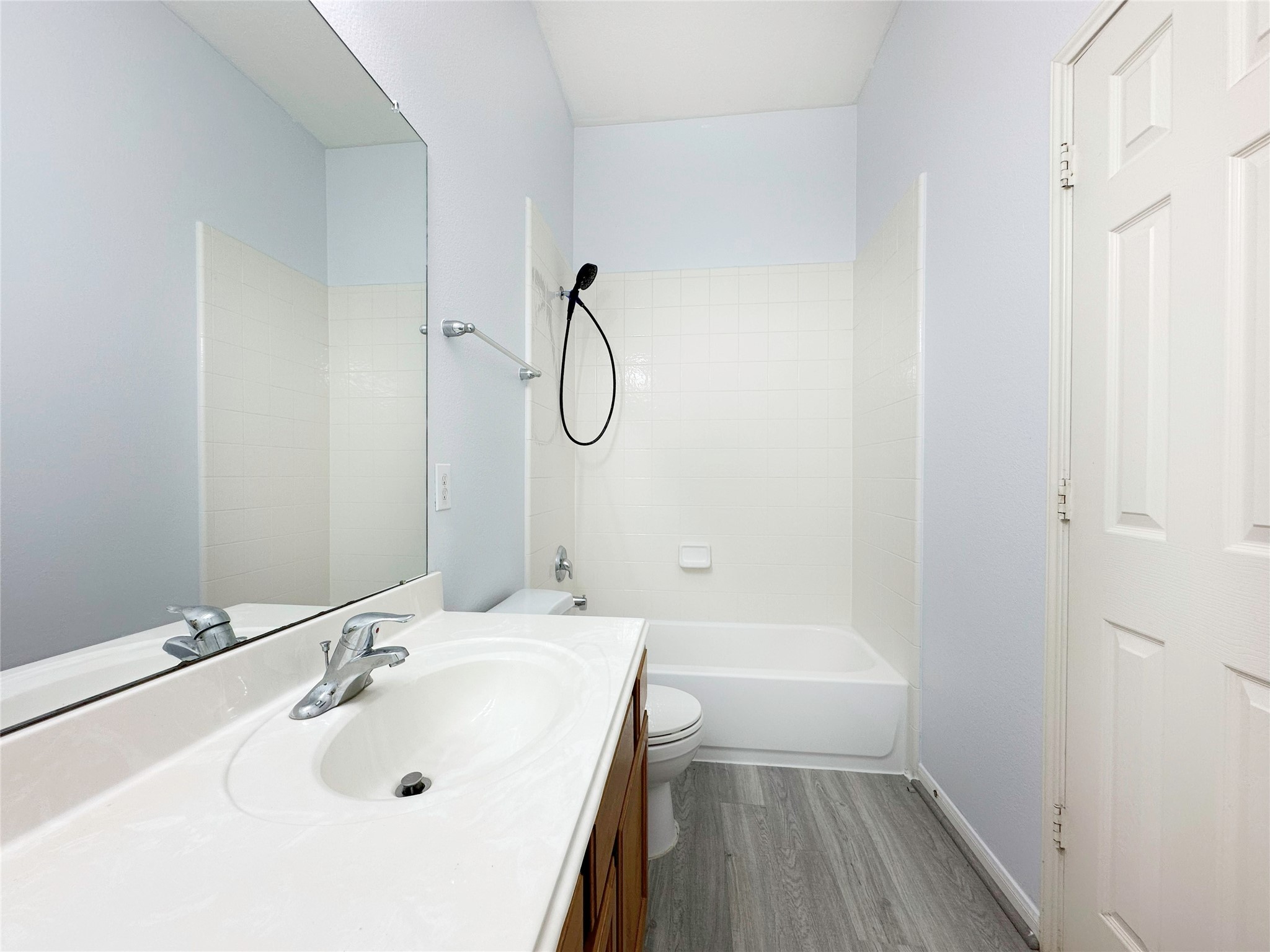 2910 Lemmingham Drive Spring, TX 77388 - Photo 22 of 31 a bathroom with a sink and a large mirror