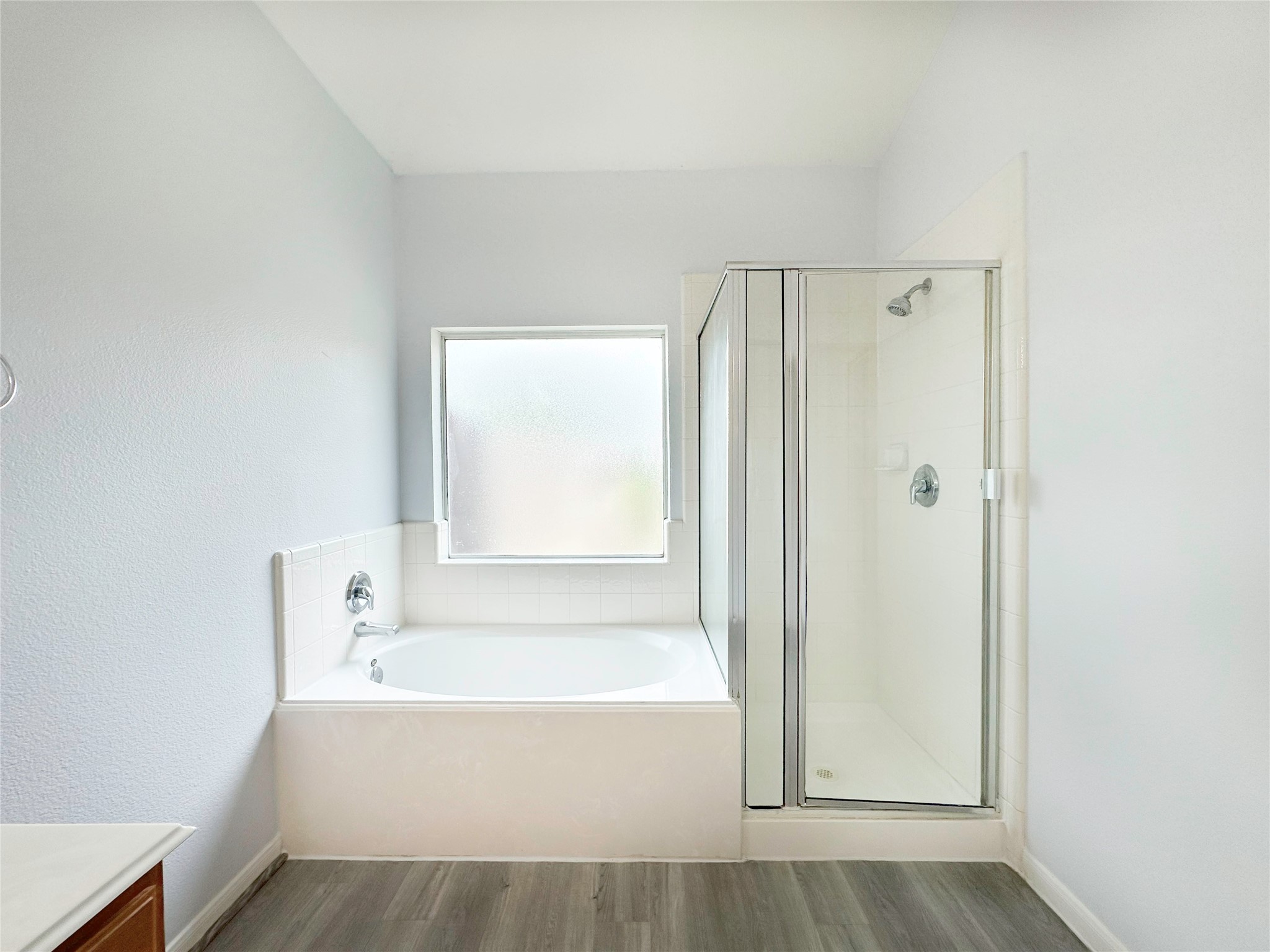 2910 Lemmingham Drive Spring, TX 77388 - Photo 27 of 31 a bathroom with a bathtub and a shower