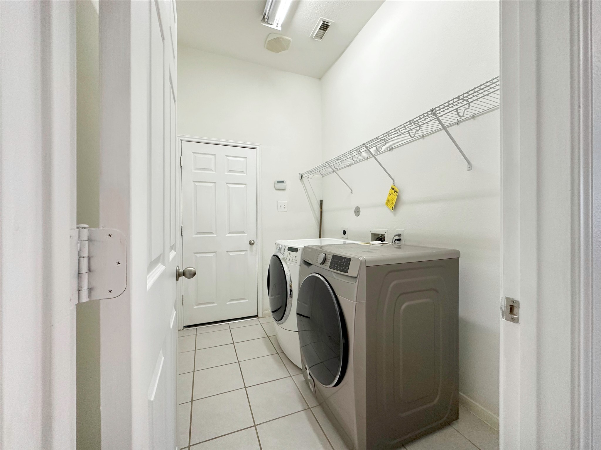 2910 Lemmingham Drive Spring, TX 77388 - Photo 29 of 31 a utility room with dryer and washer