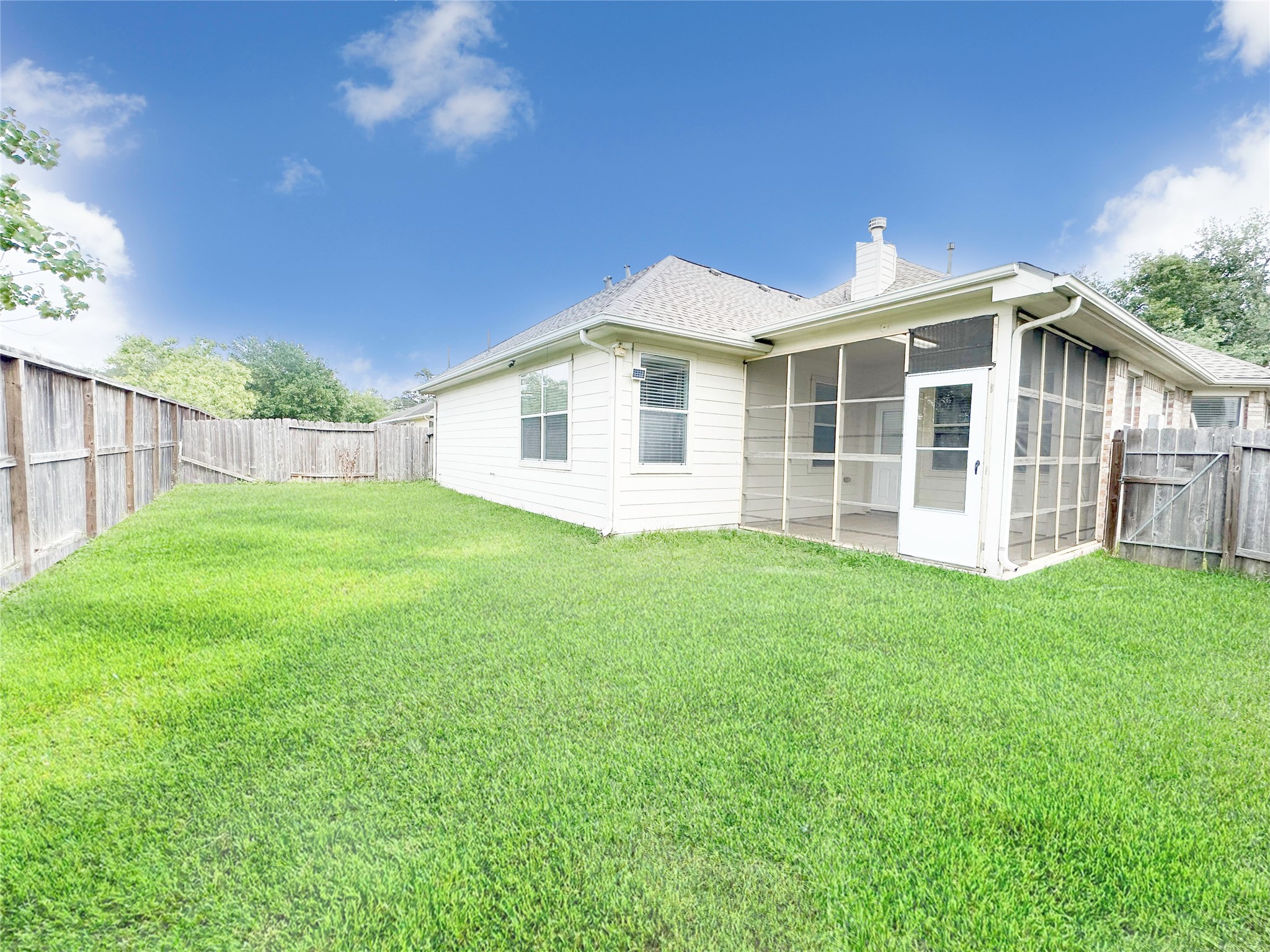2910 Lemmingham Drive Spring, TX 77388 - Photo 31 of 31 a view of a house with a yard and garden