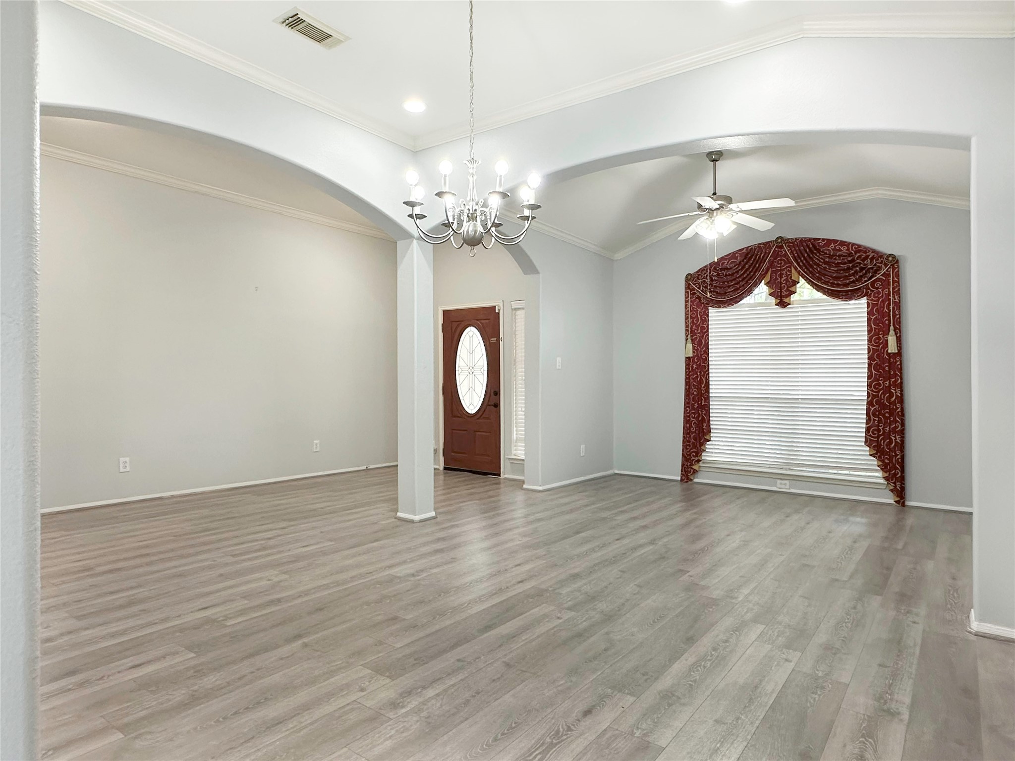 2910 Lemmingham Drive Spring, TX 77388 - Photo 5 of 31 wooden floor in an empty room with a window