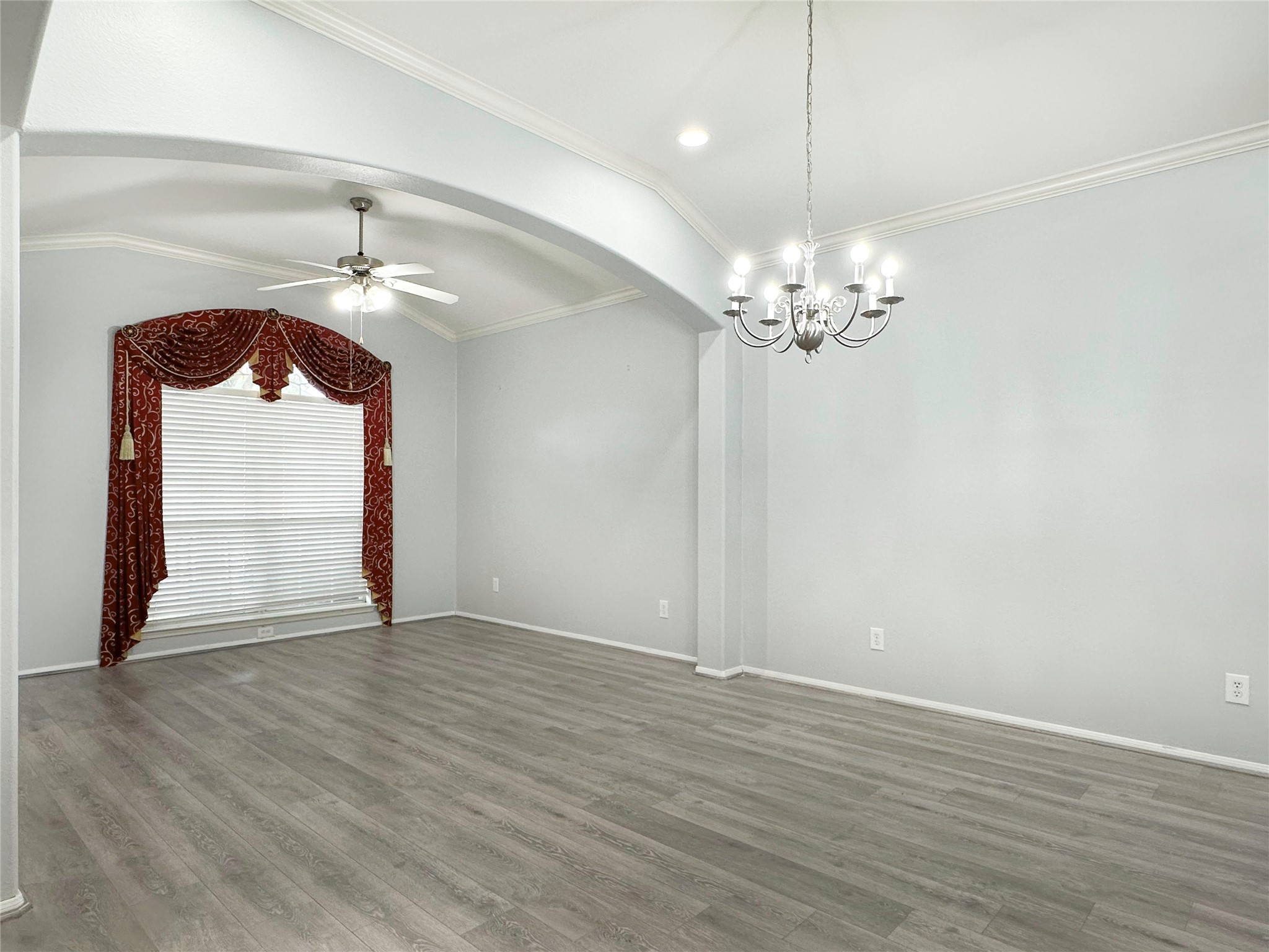 2910 Lemmingham Drive Spring, TX 77388 - Photo 6 of 31 a view of a room with wooden floor and staircase