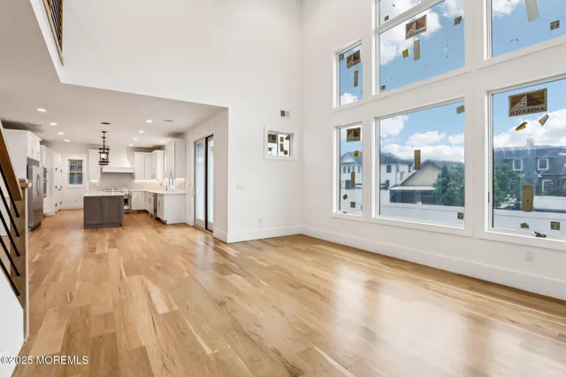 a kitchen with a stove a sink and a refrigerator