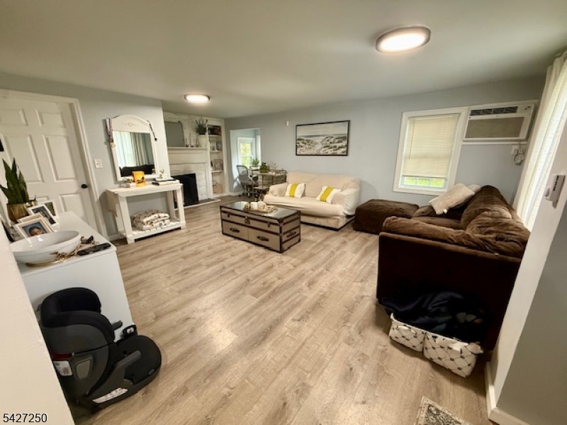 182 Stephensburg Road Port Murray, NJ 07865 - Photo 9 of 25 a living room with furniture and a flat screen tv