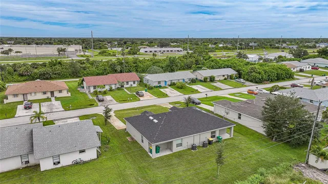 an aerial view of a house with garden space and outdoor space