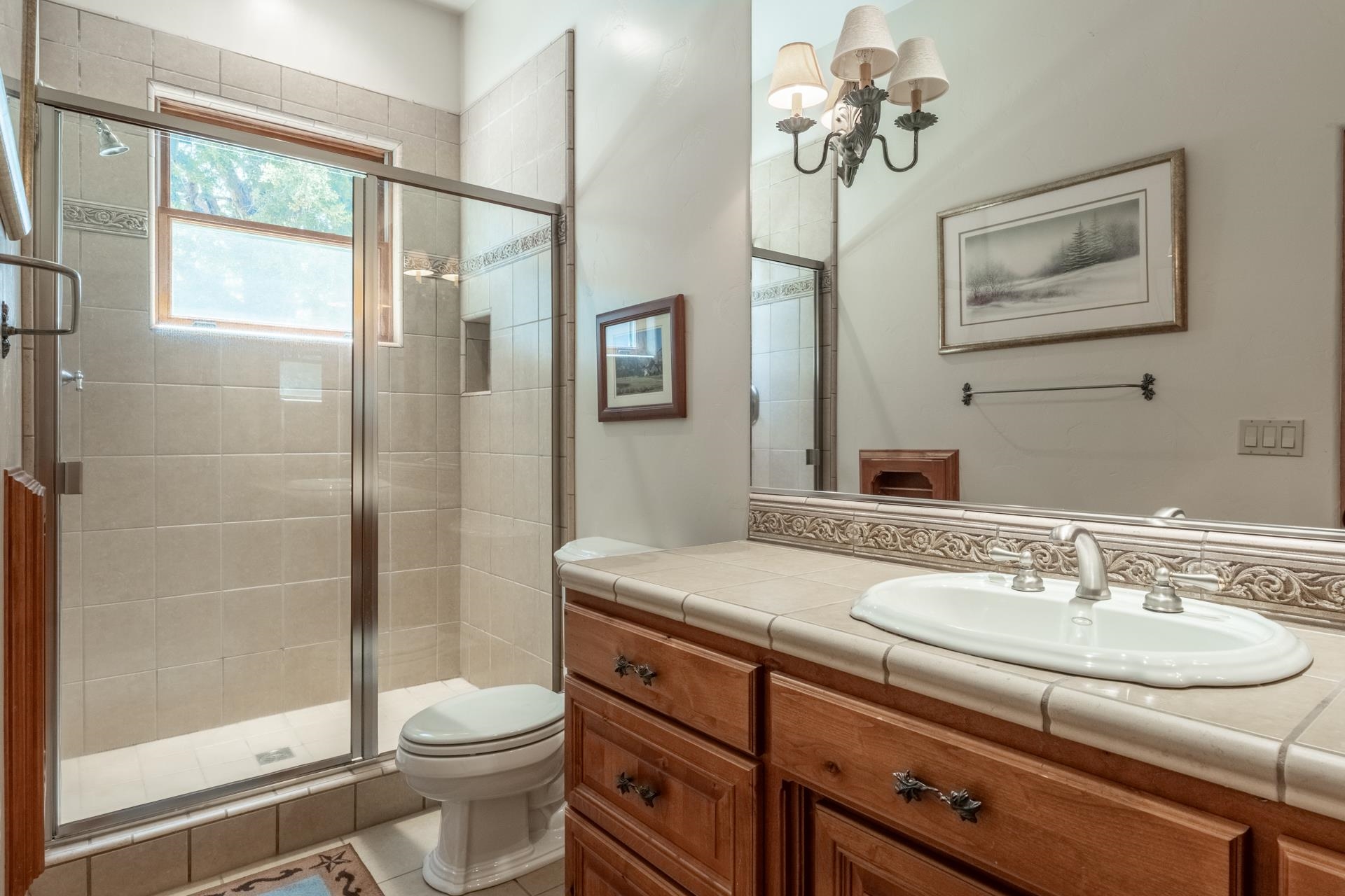 45 Skyline Road June Lake, CA 93529 - Photo 40 of 58 a bathroom with a sink a toilet and a mirror