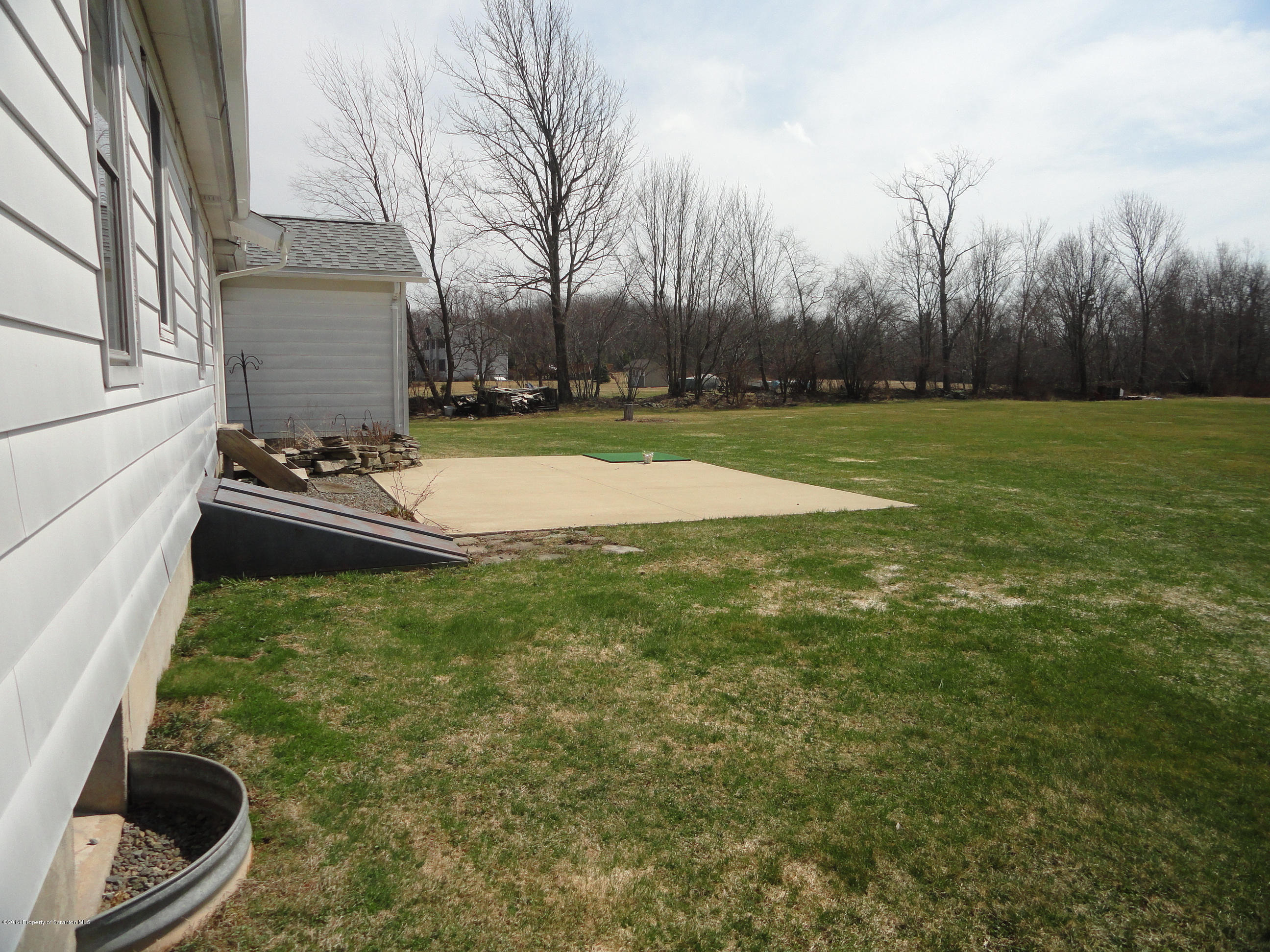 2310 Quicktown Road Moscow, PA 18444 - Photo 36 of 52 a backyard of a house with lots of green space