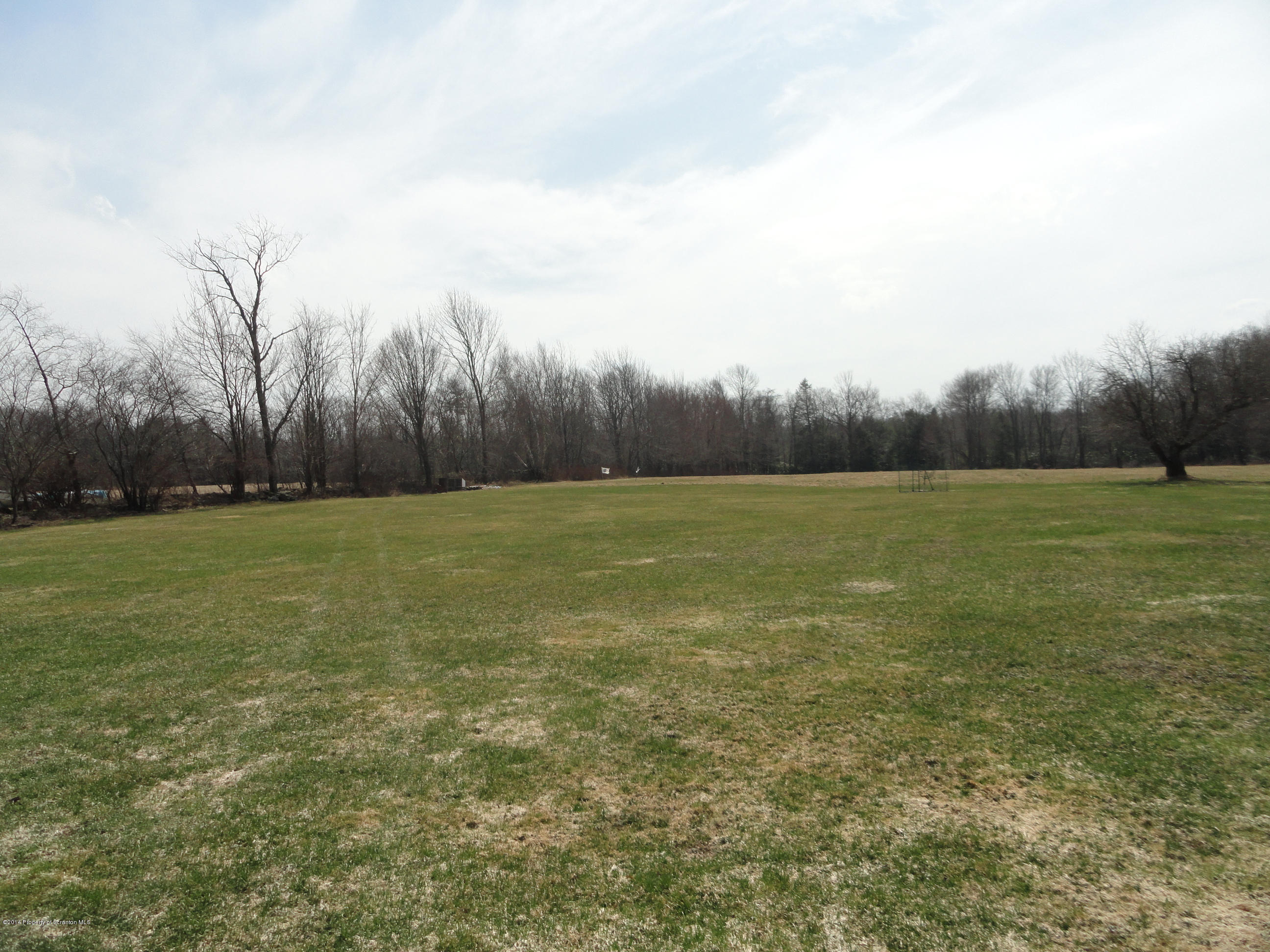 2310 Quicktown Road Moscow, PA 18444 - Photo 40 of 52 a view of a field with trees in the background
