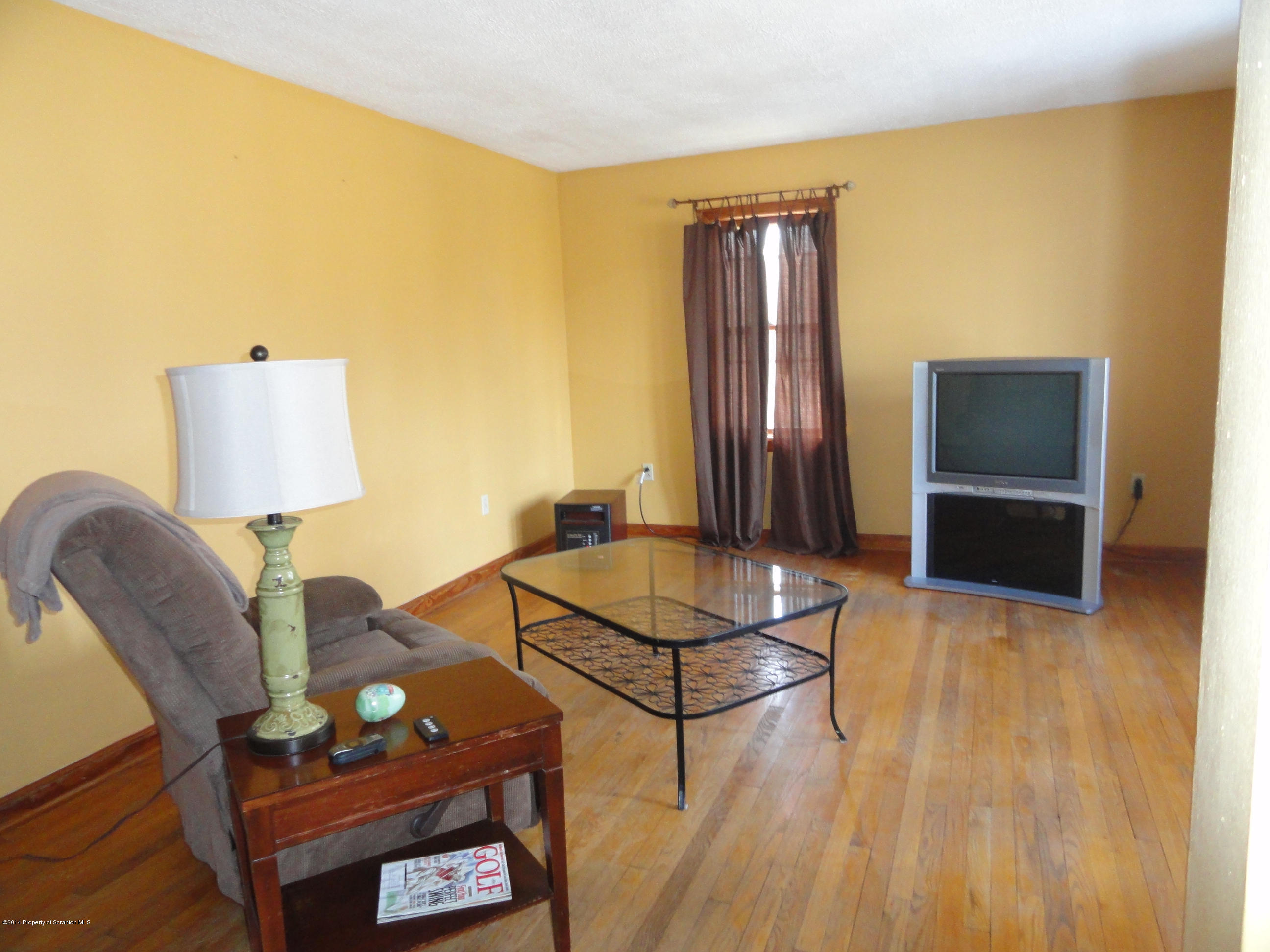 2310 Quicktown Road Moscow, PA 18444 - Photo 5 of 52 a living room with furniture and a flat screen tv